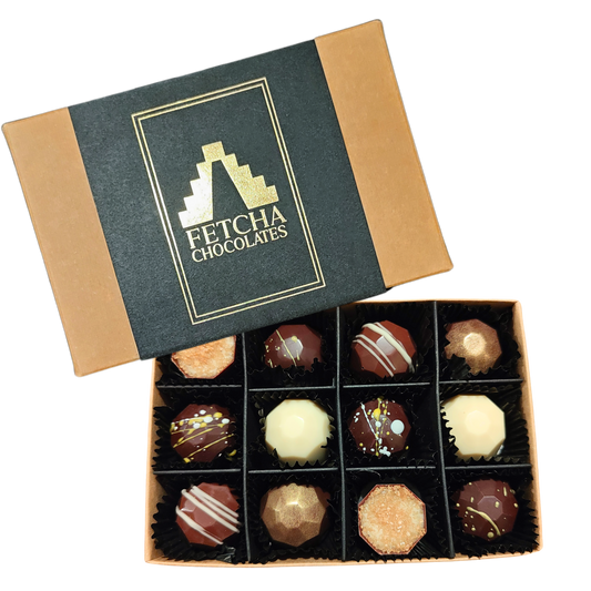 Image shows Fetcha Chocolates handmade Shop Favourites collection of filled chocolates, which are vegan, dairy free, gluten free and soy free and come in plastic-free packaging.