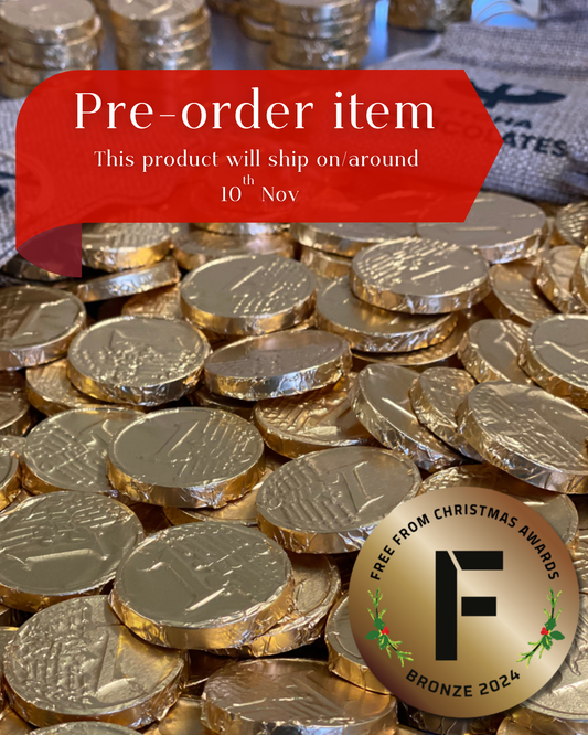 Gold coins with a red pre-order banner and bronze award badge on a blurred background