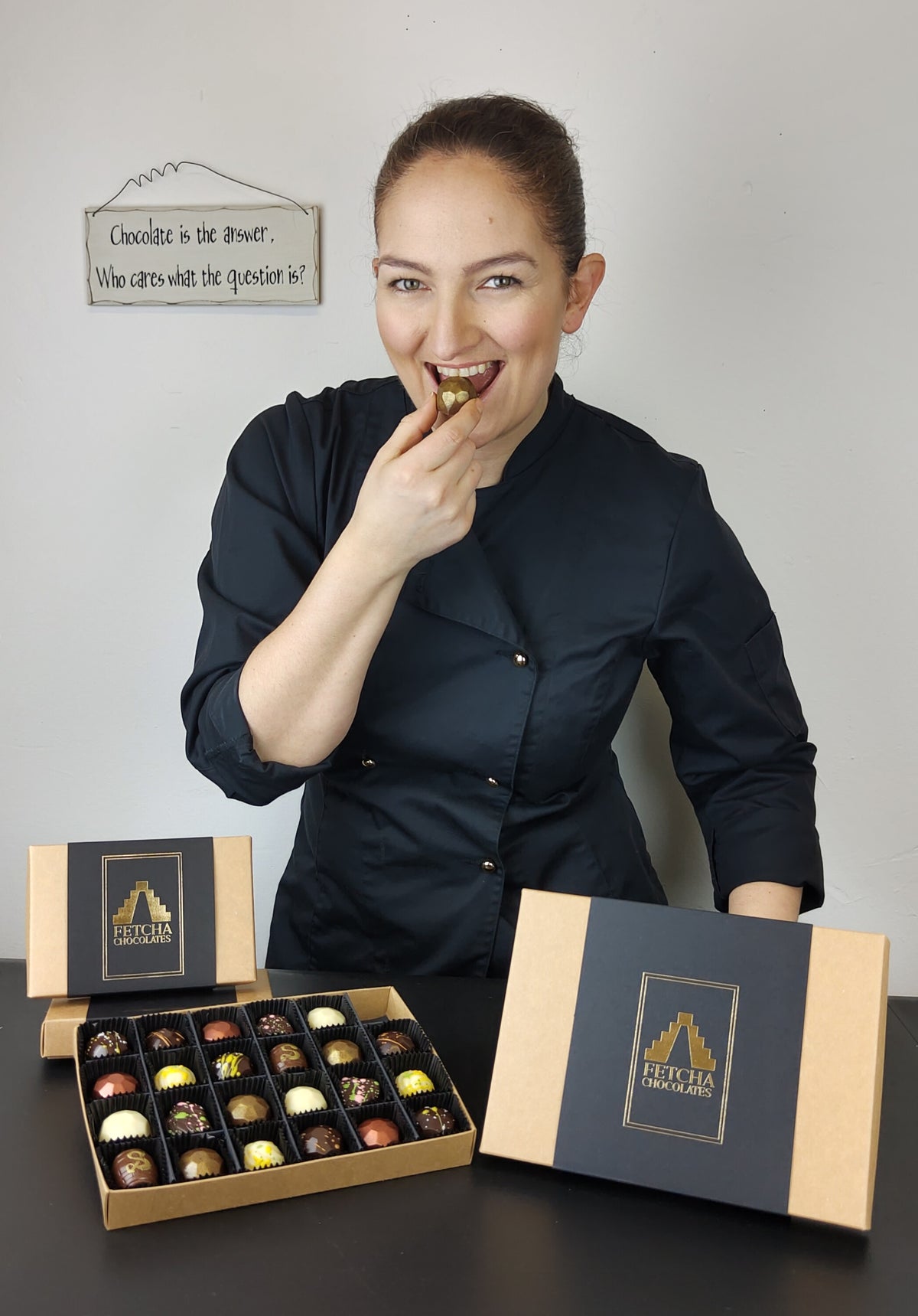 The owner of Fetcha chocolates eating her chocolates