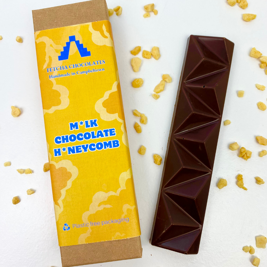 Image shows fetcha chocolates milk chocolate honeycomb bar. Vegan, dairy free and gluten free