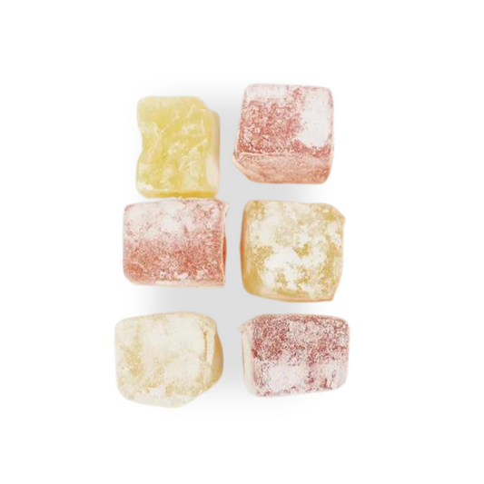 Image shows 6 pieces of vegan turkish delight, yellow and pink for lemon and rose, being sold by Fetcha Chocolates