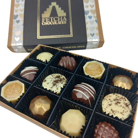 Image shows Milk and white valentines collection off vegan, dairy free and gluten free chocolates from Fetcha Chocolates